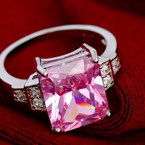 Beautiful large pink gemstome ring w/ cz accents